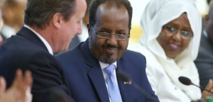 LONDON, UNITED KINGDOM - MAY 7:  Prime Minister David Cameron (L) and Somali President Hassan Sheikh Mohamud (C) shake hands after making their opening speeches during the Somali conference, on May 7, 2013 in London, England. The international conference aims to help rebuild the east African country after more more than two decades of conflict.  (Photo by Andrew Winning - WPA Pool/Getty Images)