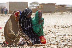 Women pray as they wait for assistance at Hariirad town of Awdal region, Somaliland. REUTERS/Feisal Omar